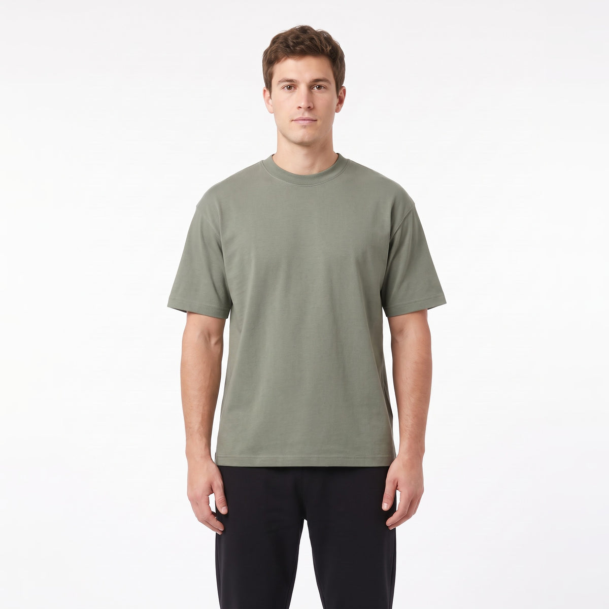 Heavyweight blank tee in sage on a male model